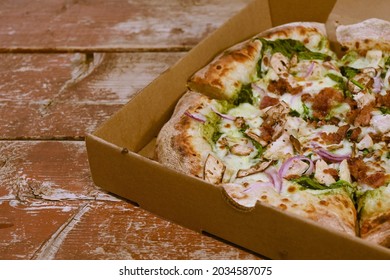 Horizontal Frontal Plane Of Homemade Pizza On Wooden Table