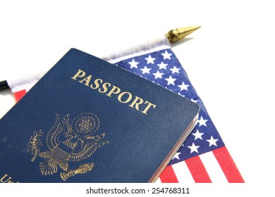 A Horizontal Image Of An American Passport On An American Flag