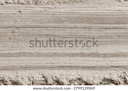 Horizontal layers of white chalk stone texture