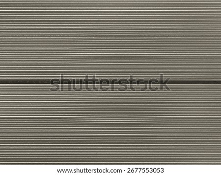 Horizontal linear fluted panel or fluted strips carved on a wall tiles. 3D carved horizontal fluted panel, seamless background texture.