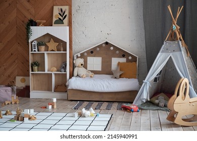 Horizontal No People Shot Of Modern Loft Kids Room Interior With Various Toys And Teepee In Daylight