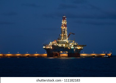 Horizontal Oil Drilling Platform At Night In Canary Islands