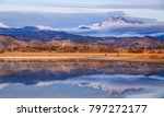 Horizontal orientation color image of McIntosh Lake, Longmont, Colorado, USA at sunrise, with Meeker and Long