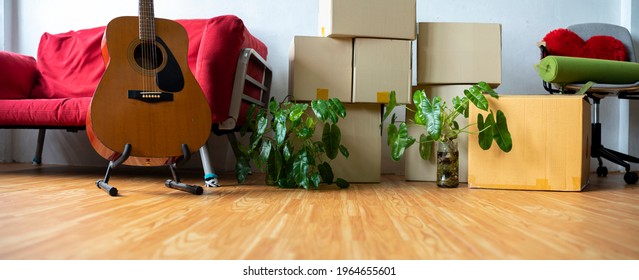 Horizontal Photo Heap Of Cardboard Boxes With Personal Belongings In Living Room At Moving Relocation Day No People, Delivery Service Concept, Banner For Website Header Design With Copy Space For Text