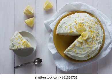 Horizontal Photo Of Lemon Cream Sponge Cake With Zest Top View