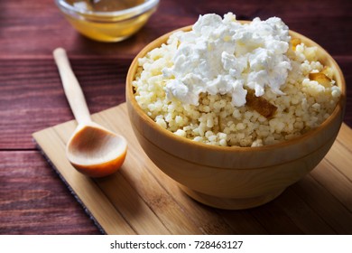 Horizontal Photo Of Millet Porridge With Pear And Cottage Cheese