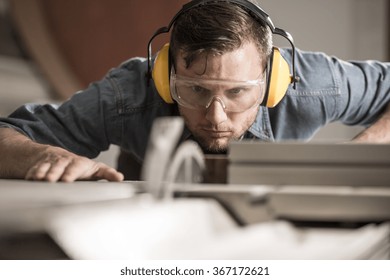 Horizontal photo of professional saw operator preparing ideal board