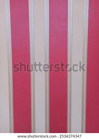 The horizontal red and white colors between these colors are decorated with gold