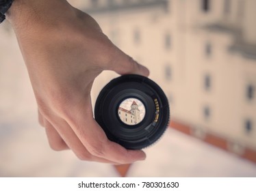 A Horizontal Rotated Image Of A Photographic View Of Bratislava Castle (Hrad) Through A Camera Lens Held By A Photographer’s Hand During Mid Day. Captured In Bratislava, Capital Of Slovakia.