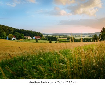 Horizontal Rural Landscape with Farmhouses at Dusk - Powered by Shutterstock