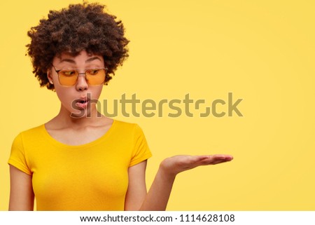 Similar – Image, Stock Photo Black woman, afro hairstyle, on roller skates riding outdoors on urban bridge with open arms.