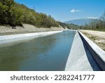 Horizontal shot of Artificial river channel in concrete