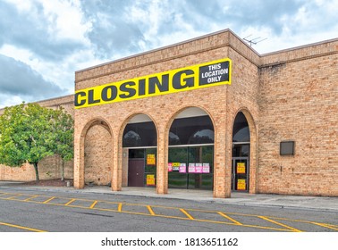 Horizontal Shot Of A Bankrupt Retail Anchor Store Going Out Of Business Following The Pandemic.