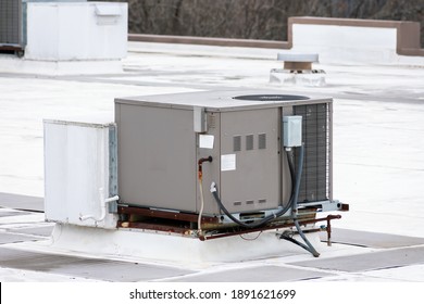 Horizontal Shot Of A Commercial Rooftop Air Conditioning Unit.