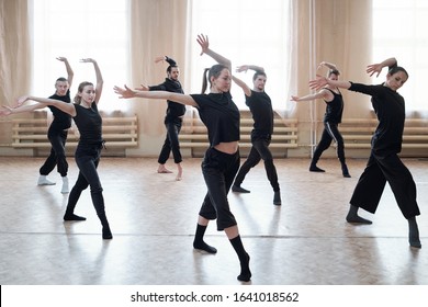 Horizontal Shot Of Contemporary Dance Team Learning New Movements In Their Rehearsal Moves