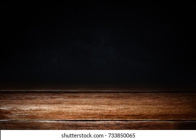Horizontal shot of the elegant brown wooden texture on dark background - Shutterstock ID 733850065
