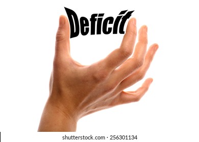 Horizontal shot of a hand squeezing the word "Deficit" between two fingers, isolated on white.