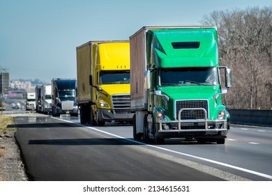 Horizontal Shot Of An Interstate Truck Convoy.