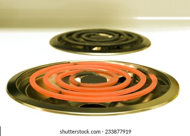 Horizontal Shot Of Red Hot  Electric Stove Burner 