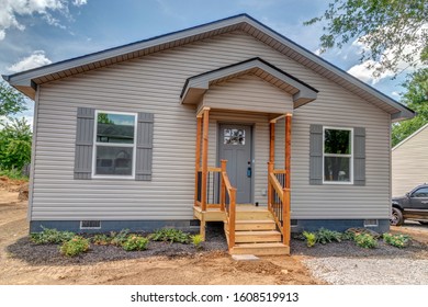 Horizontal Shot Of A Starter Tract Home Under Construction.