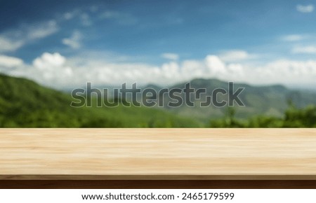 horizontal table with mountain forest behind
