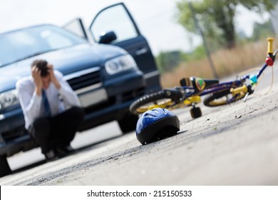 Horizontal view of a scared driver after accident