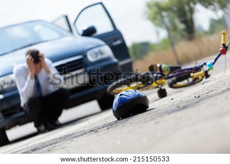 Horizontal view of a scared driver after accident