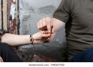 Horizontal View Of Smoking Marijuana After School