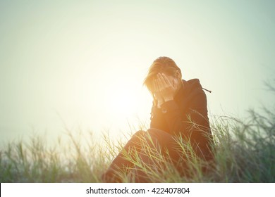 Horizontal View Of  Young Woman Crying