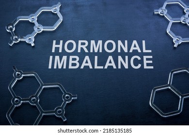 Hormonal imbalance on the blackboard and chemical models. - Shutterstock ID 2185135185
