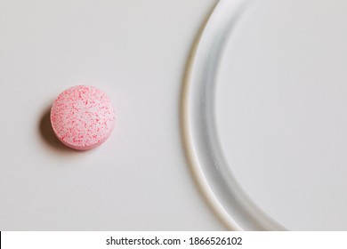  Hormone Ring And Tablets On A White Background. Contraceptive Ring