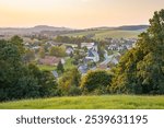 HORNI CERMNA (HORNÍ ČERMNÁ), CZECH REPUBLIC (CZECHIA) – AUGUST 27, 2024: View of the village centre with an evangelical church and nearby rectory building, Pardubice Region (Pardubický kraj)