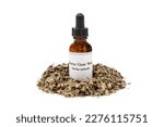 Horny Goat Weed herbal tincture and dried herb isolated on white background.
