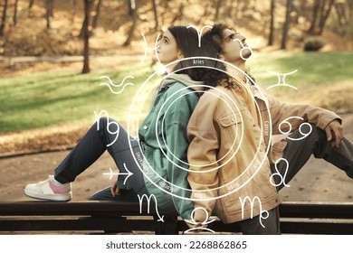 Horoscope compatibility. Loving couple outdoors and zodiac wheel