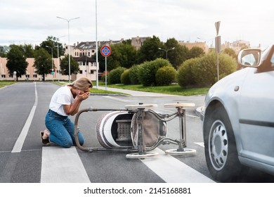 Horrified Mother On The Crosswalk After A Car Accident When A Vehicle Hits Her Baby Pram. Concepts Of Safety, Traffic Code And Insurance.