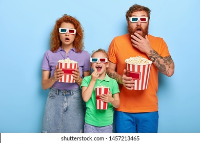 Horrified Parents And Cheerful Daughter Spend Free Time At Cinema, Enjoy Watching Exciting New Film With Scarying Plot, Eat Tasty Popcorn From Buckets, Wear Three Dimension Glasses For Illusion