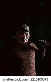 Horror Character Wearing Mas And Holding Chainsaw, Halloween Scary Scene.