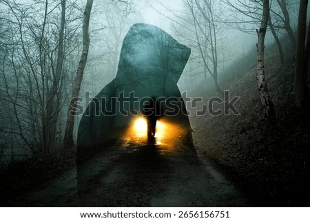 a horror edit of a double expsoure of a ghost like figure. in front of car headlights. On a spooky foggy winters evening in a forest.