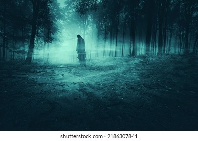 horror forest landscape with scary ghost - Shutterstock ID 2186307841