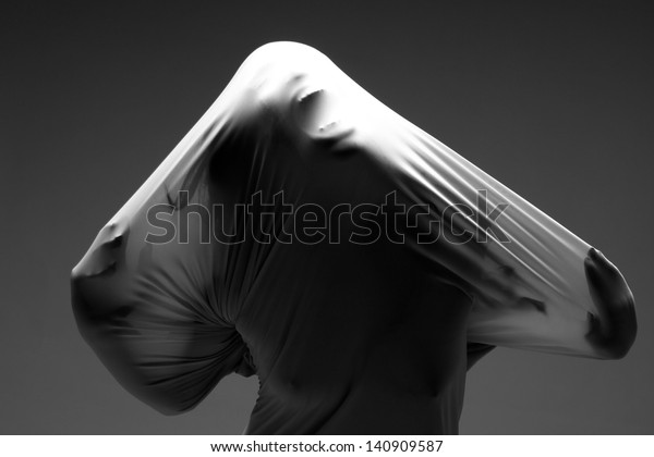 Horror Image of a\
Woman Trapped in Fabric