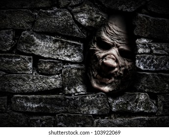 Horror Monster Looking Out From Hole In The Wall