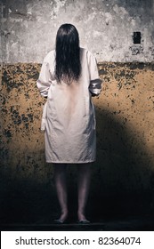 Horror Scene With Girl In A White Coat