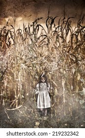 Horror Scene With Scary Little Girl In A Corn Field