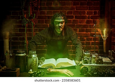 Horror thriller movie. A medieval alchemist is looking for the elixir of youth. An ugly man with scars on his face - an obsessed scientist works in his laboratory with old manuscripts. Halloween. 