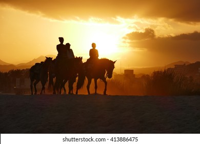 Horse Back Ride At Sunset On Mexican Beach