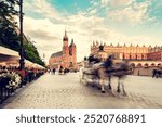 Horse carriage in the market square old town in Cracow, Poland.