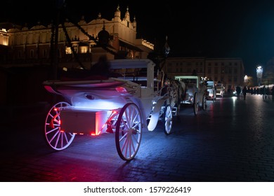 A Horse Carriage At Night In Cracow.