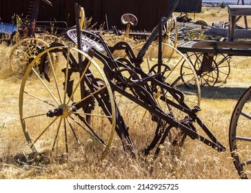 Horse Drawn Four Bladed Shallow Plow In Farm Equipment Grave Yard In Shaniko, OR.