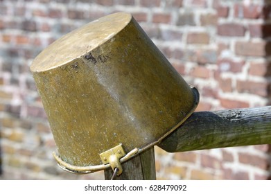 Horse Feed Bucket On Wooden Fence