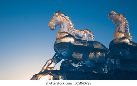 Horse Ice Sculpture With Blue Sky And Sunset.